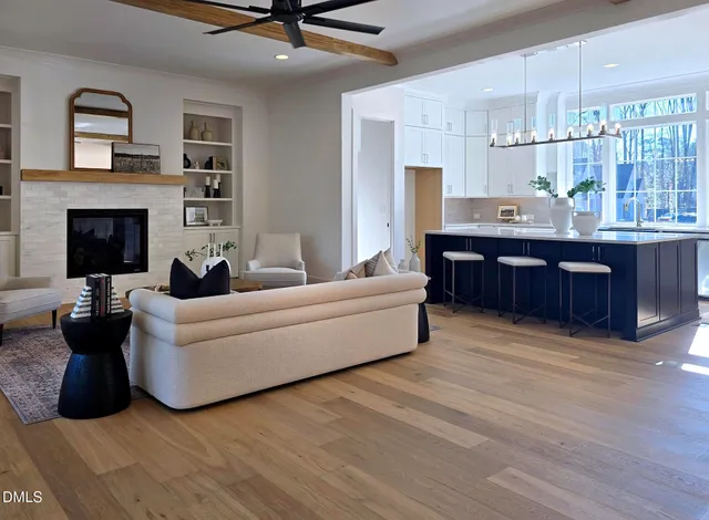 a kitchen with stainless steel appliances granite countertop a sink and cabinets