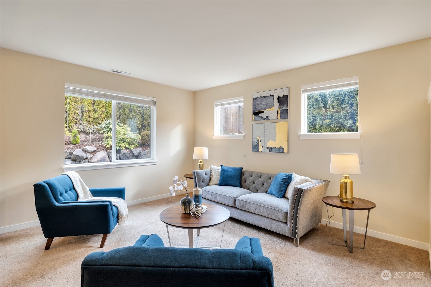 19867 Mountain Ridge Road Southeast Monroe, WA 98272 - Photo 11 of 40 a living room with furniture and a large window
