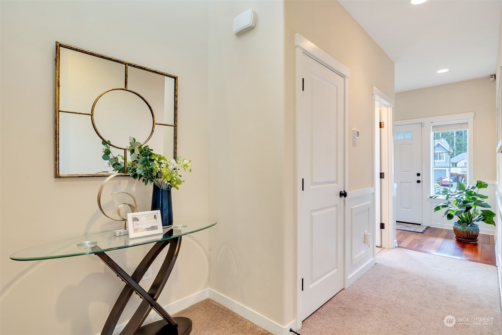 19867 Mountain Ridge Road Southeast Monroe, WA 98272 - Photo 13 of 40 a view of a hallway with a potted plant