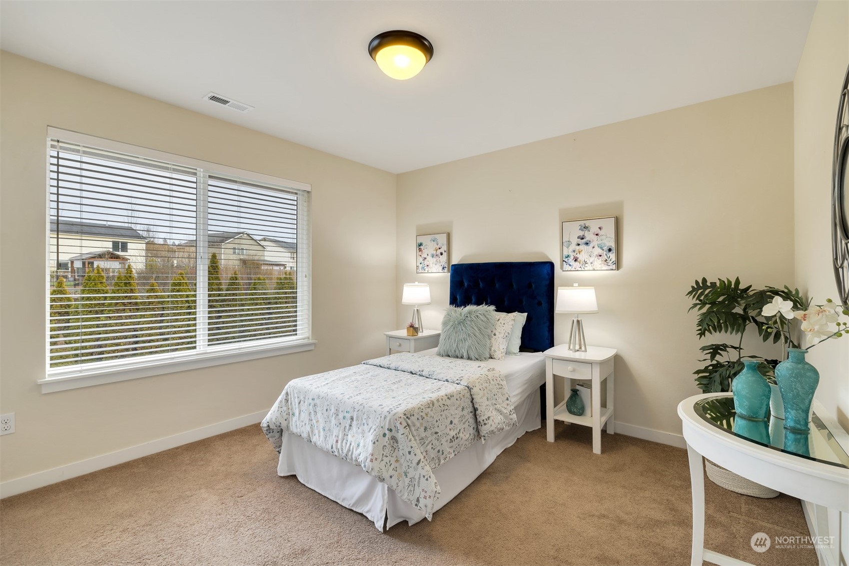 19867 Mountain Ridge Road Southeast Monroe, WA 98272 - Photo 23 of 40 a bedroom with a bed and a window
