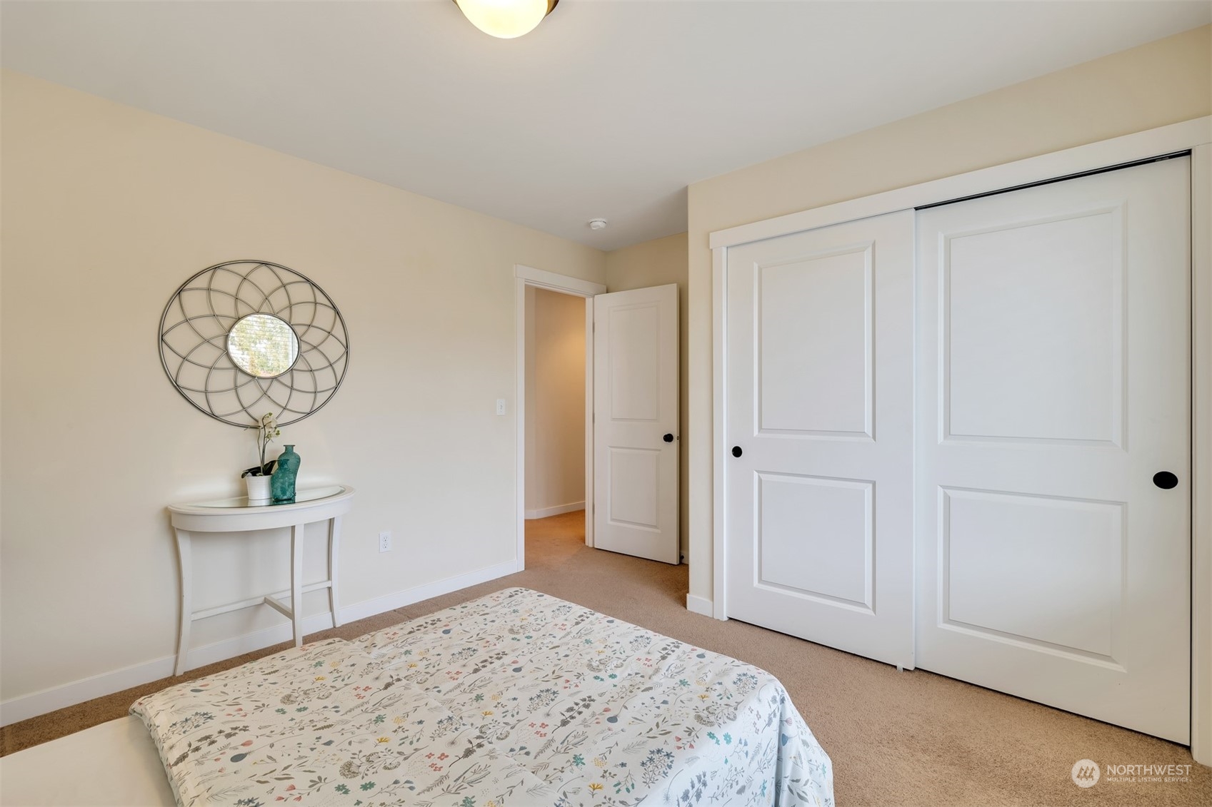 19867 Mountain Ridge Road Southeast Monroe, WA 98272 - Photo 24 of 40 a view of a room with wooden floor and closet