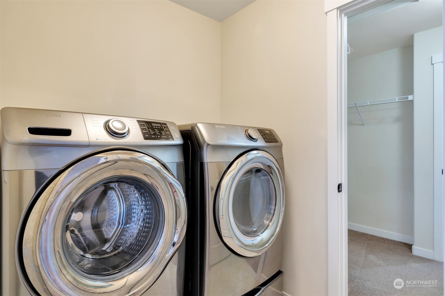 19867 Mountain Ridge Road Southeast Monroe, WA 98272 - Photo 25 of 40 a utility room with dryer and washer