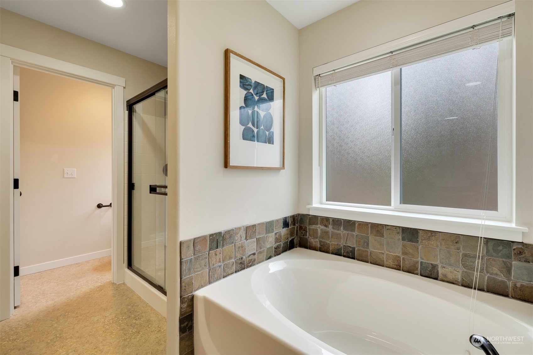 19867 Mountain Ridge Road Southeast Monroe, WA 98272 - Photo 29 of 40 a bathroom with a bathtub and a shower