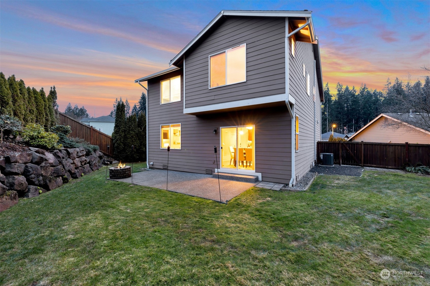 19867 Mountain Ridge Road Southeast Monroe, WA 98272 - Photo 38 of 40 a view of a house with a backyard
