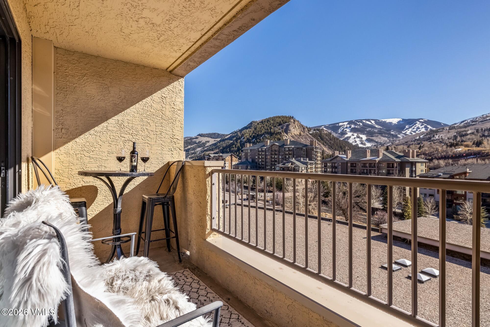 137 Benchmark Road, Unit 513 Avon, CO 81620 - Photo 16 of 31 a view of balcony with furniture