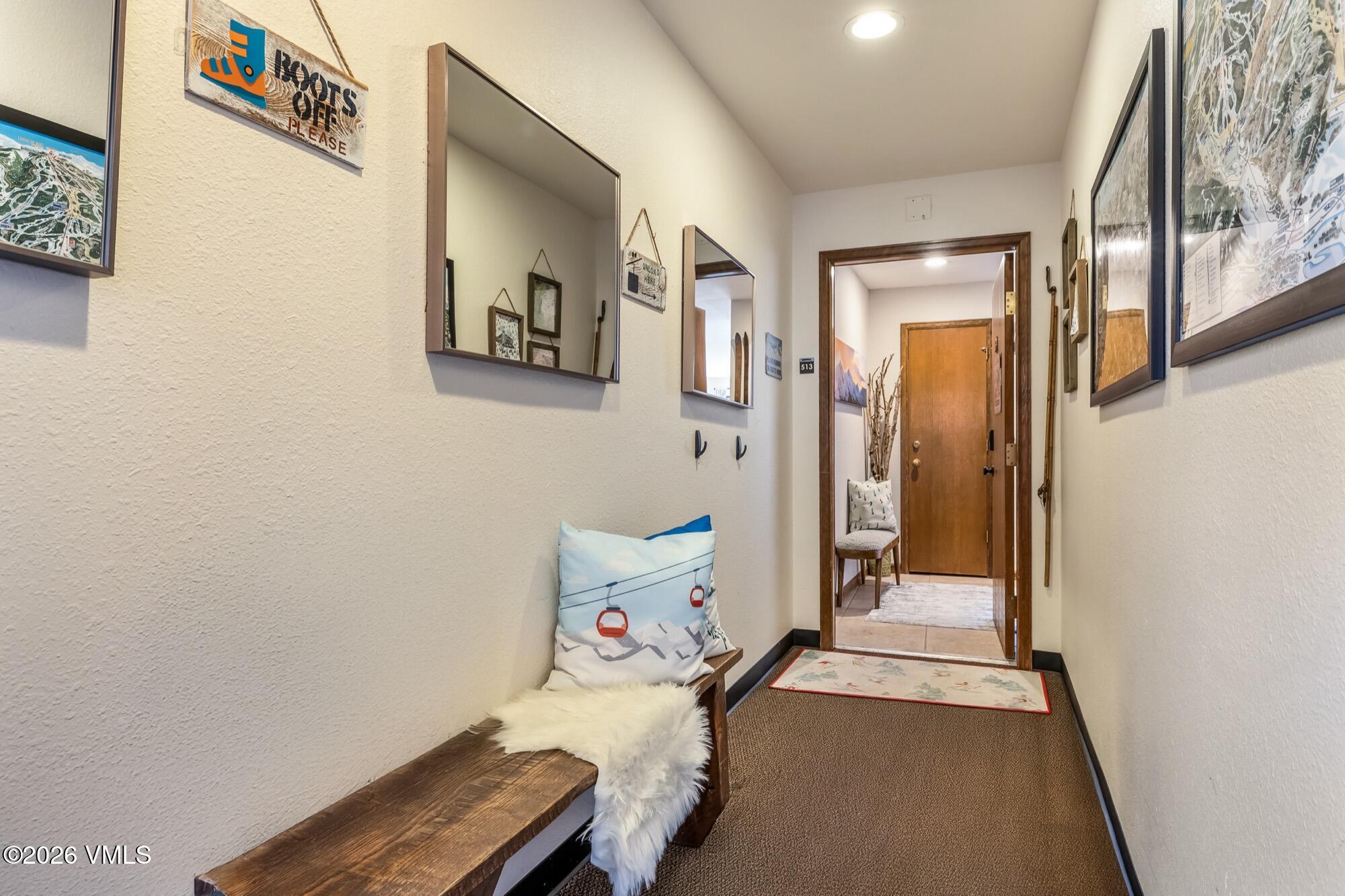 137 Benchmark Road, Unit 513 Avon, CO 81620 - Photo 27 of 31 a view of a room with shelves
