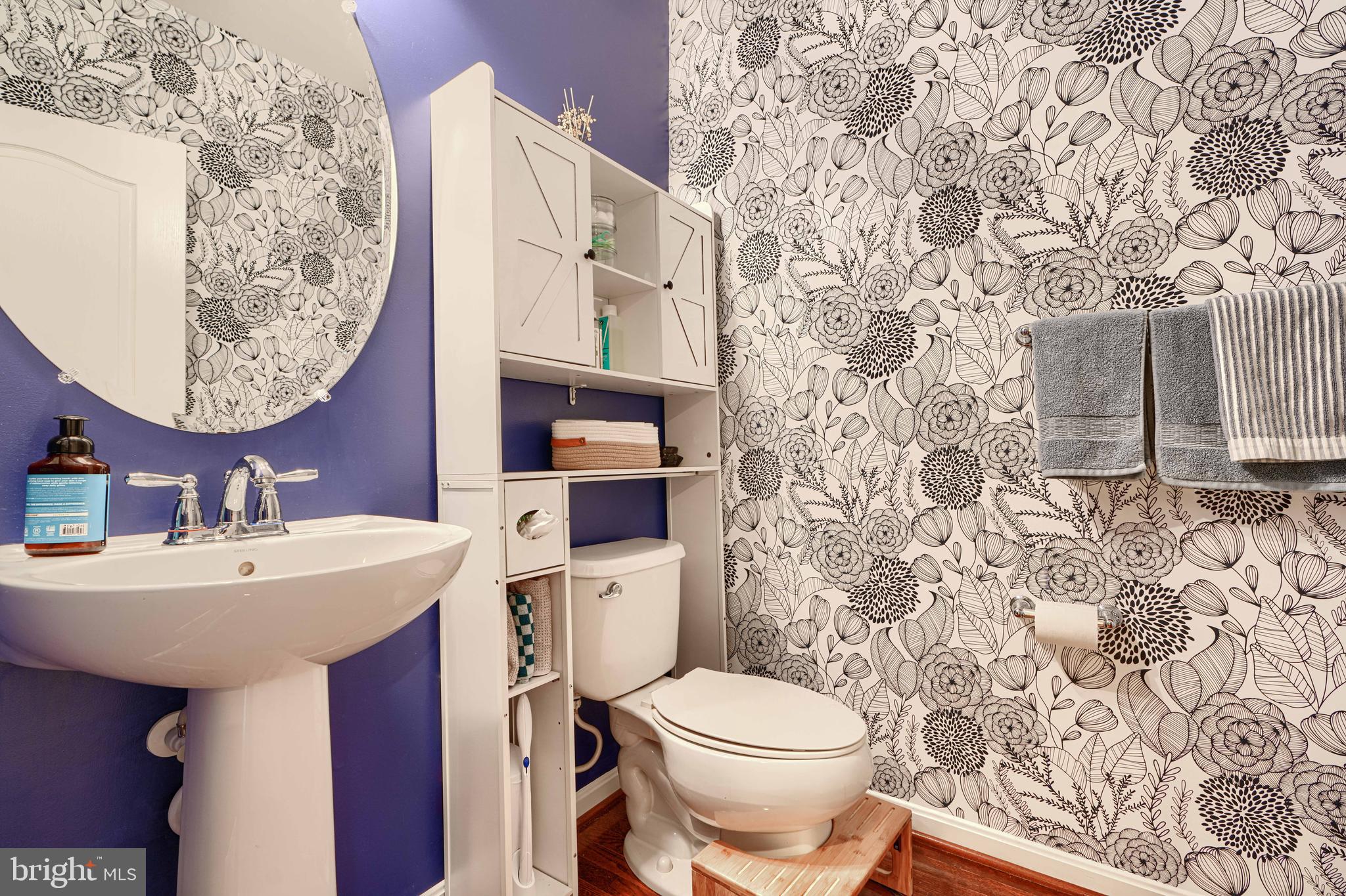 2642 Shade Branch Road Hanover, MD 21076 - Photo 16 of 29 a bathroom with a toilet sink and mirror