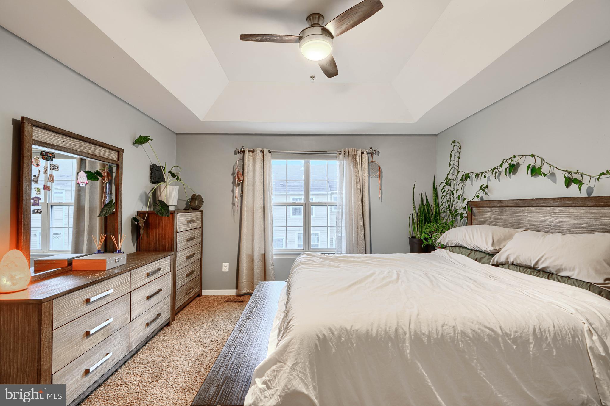 2642 Shade Branch Road Hanover, MD 21076 - Photo 22 of 29 a bedroom with a large bed and a large dresser