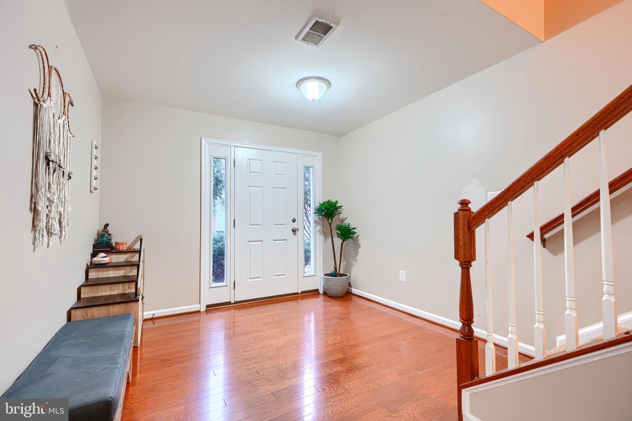 2642 Shade Branch Road Hanover, MD 21076 - Photo 3 of 29 a view of an entryway with wooden floor and door