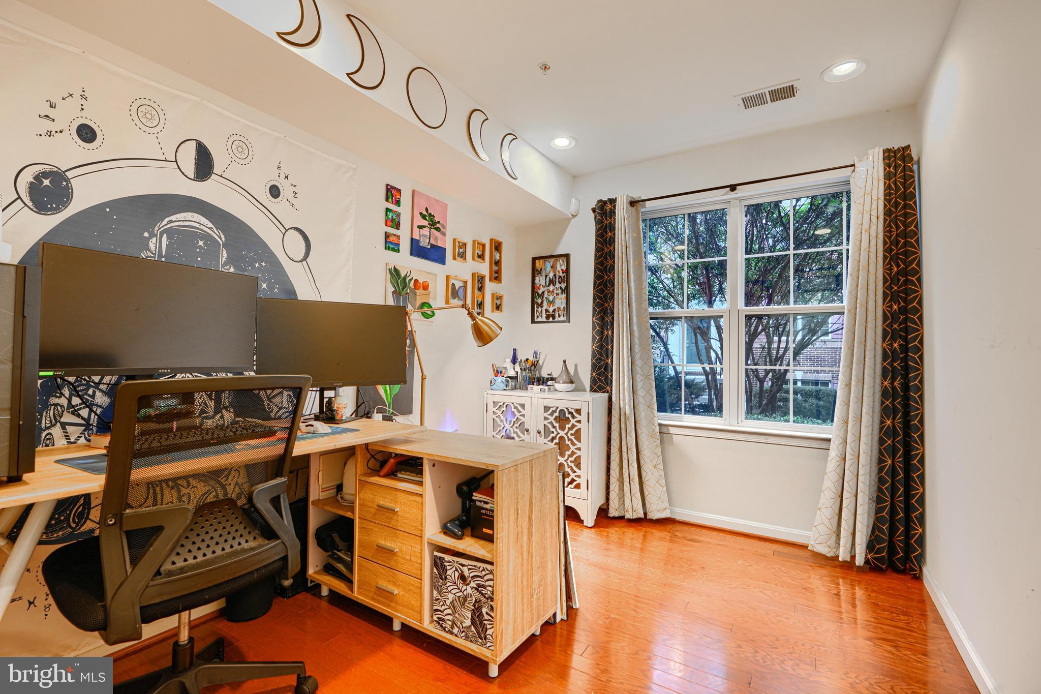 2642 Shade Branch Road Hanover, MD 21076 - Photo 4 of 29 a view of livingroom with furniture workspace and windows