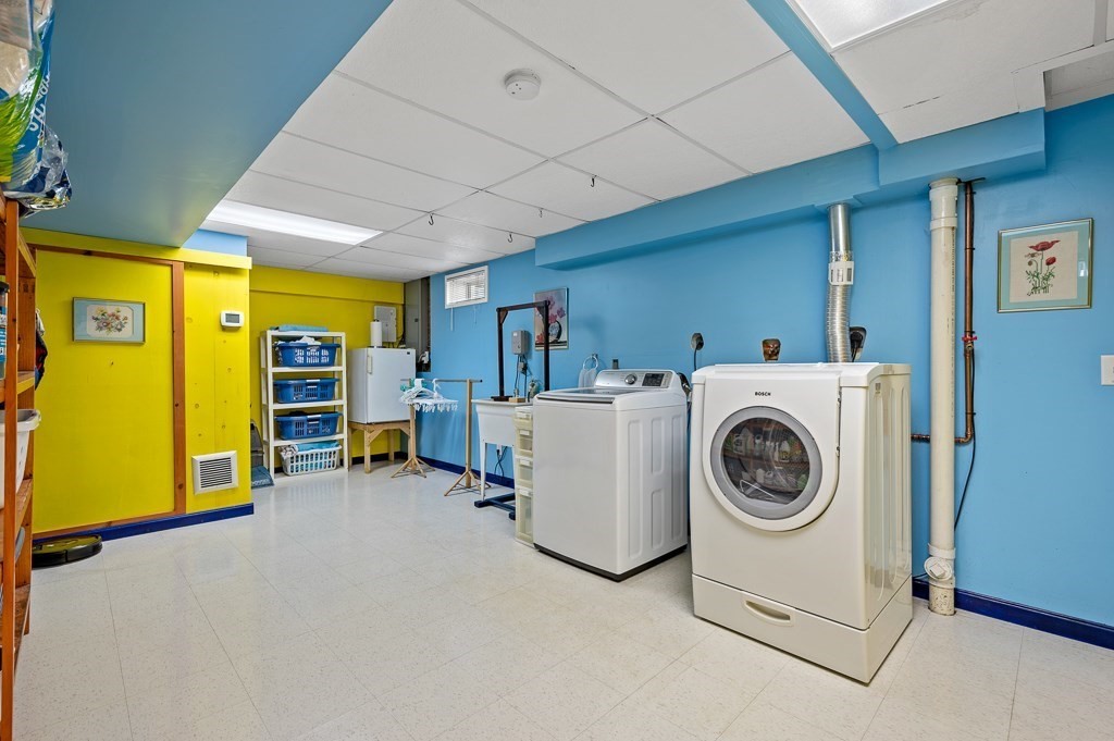 2 Gerry Drive, Unit 2 Hudson, MA 01749 - Photo 28 of 41 a utility room with dryer and washer