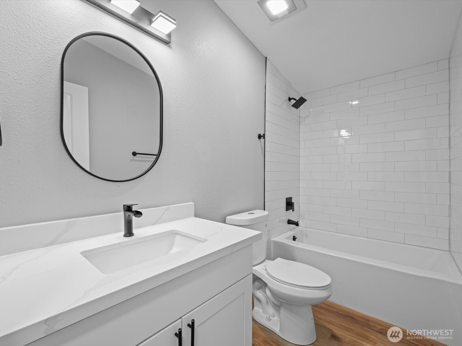 20500 32nd Drive Southeast Bothell, WA 98012 - Photo 20 of 39 a bathroom with a sink a toilet and a mirror
