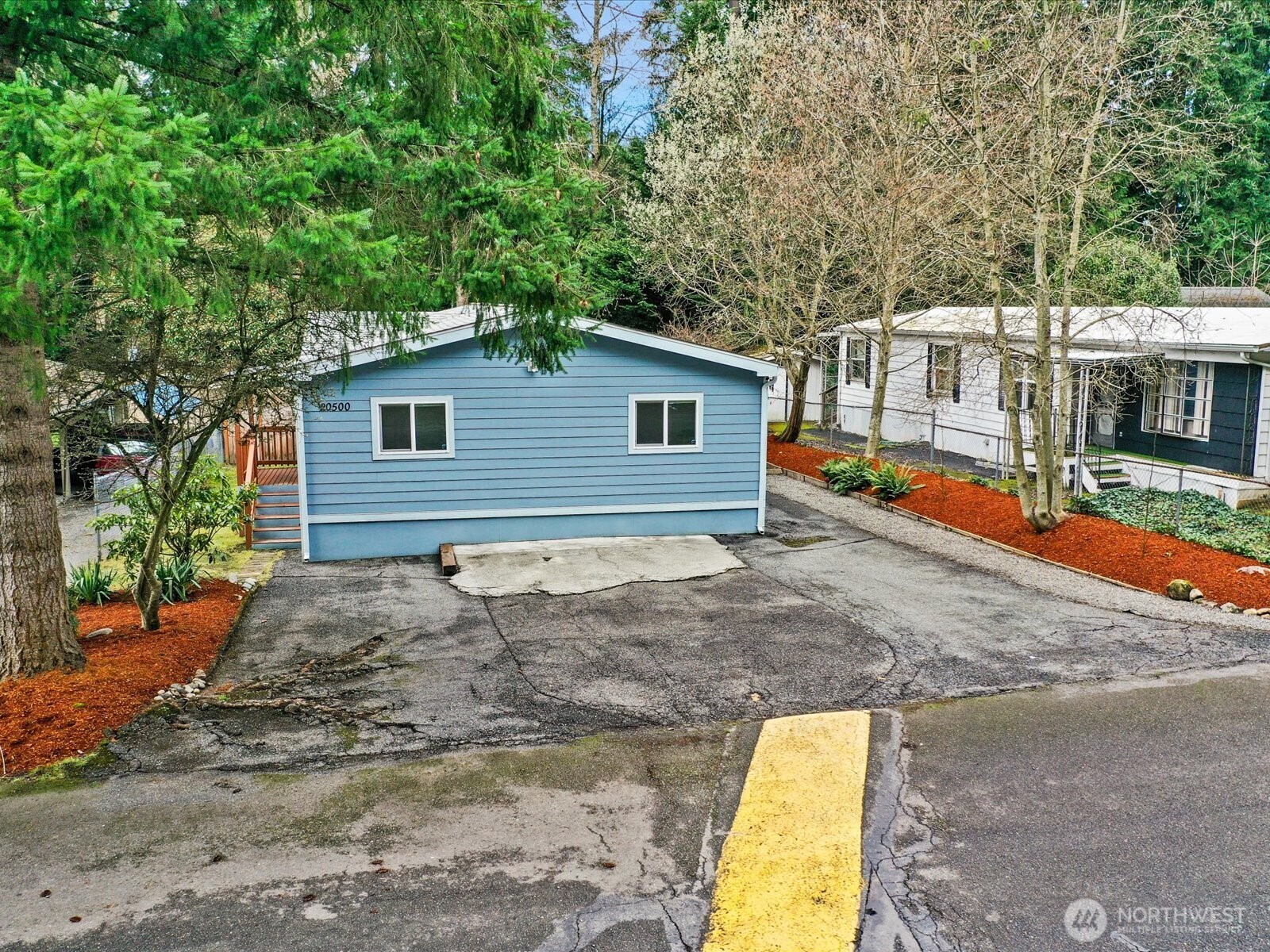 20500 32nd Drive Southeast Bothell, WA 98012 - Photo 34 of 39 a view of a house with backyard and sitting area