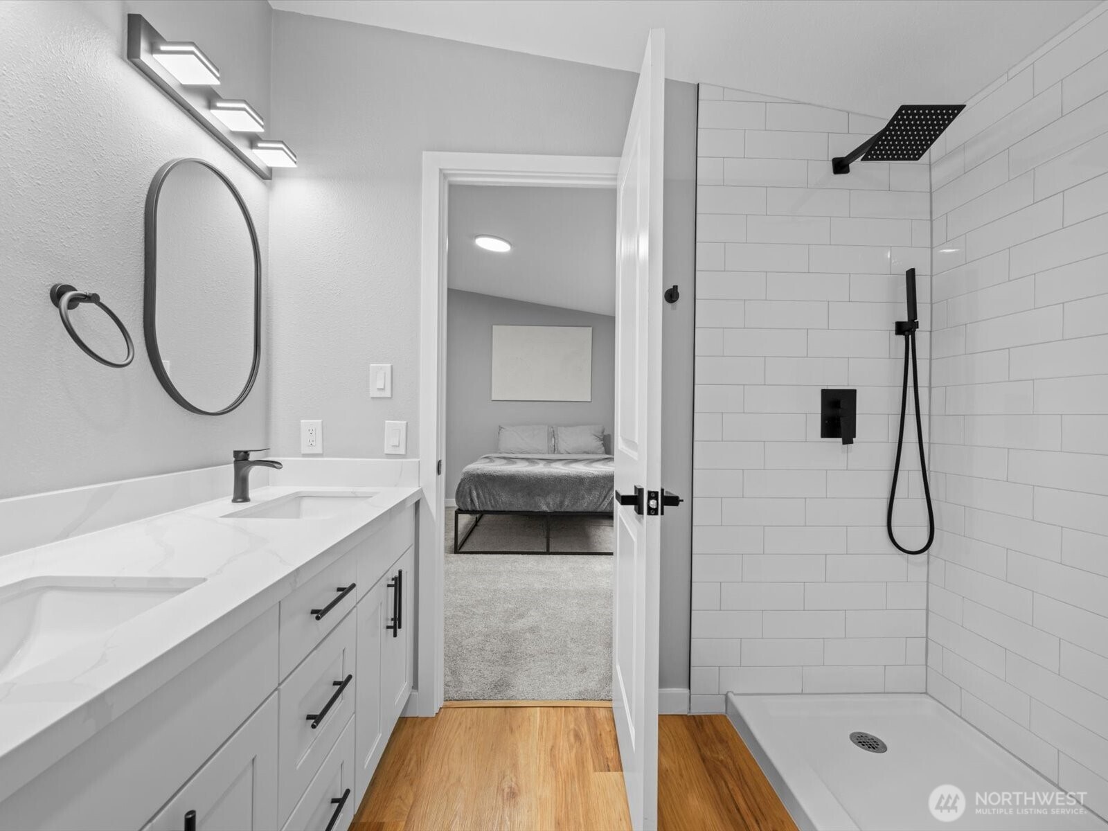20500 32nd Drive Southeast Bothell, WA 98012 - Photo 10 of 39 a en suite bathroom with a granite countertop sink mirror and shower
