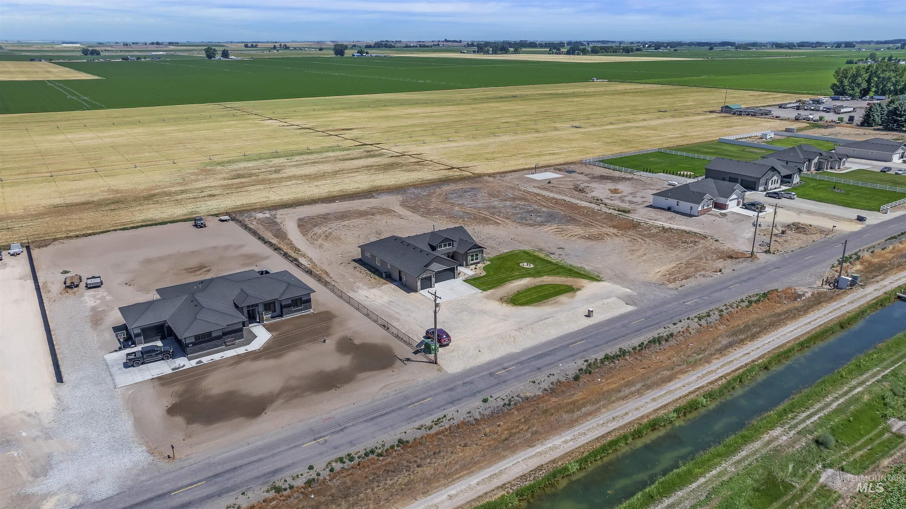378 West 100 South Rupert, ID 83350 - Photo 41 of 50 Aerial perspective showcasing multiple properties and agricultural land