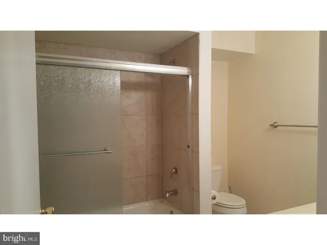 a bathroom with a sink and a shower