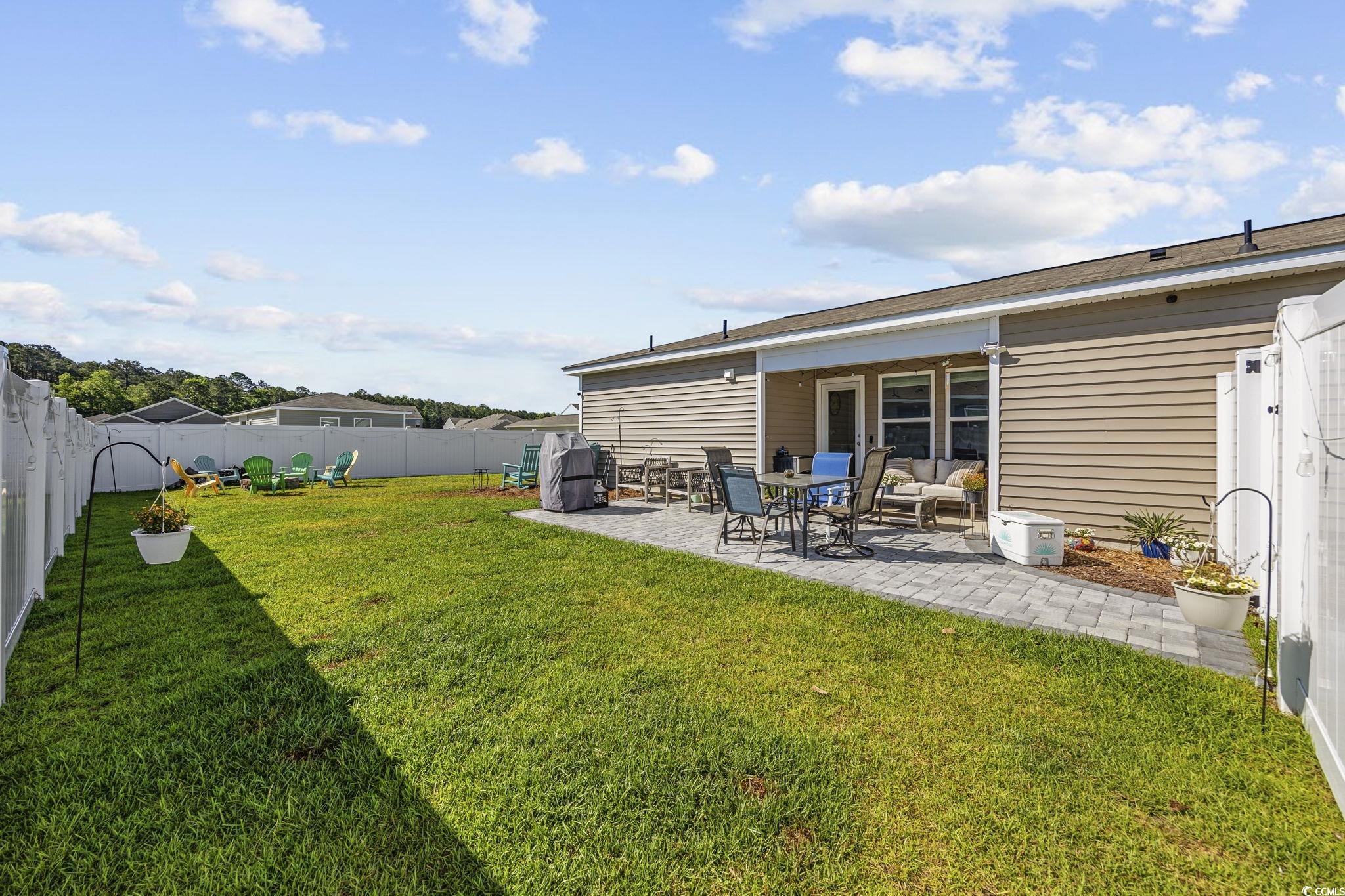 924 Akron Street Conway, SC 29526 - Photo 23 of 37 View of yard with a patio