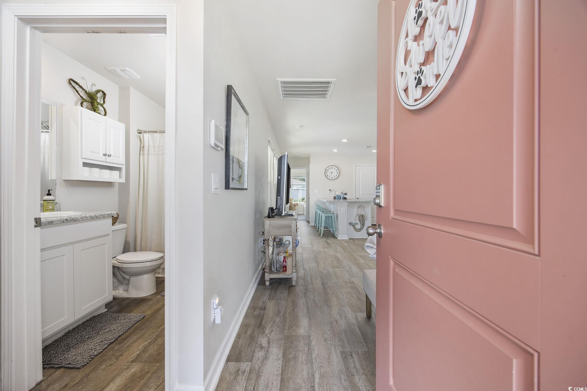 924 Akron Street Conway, SC 29526 - Photo 6 of 37 Hall featuring wood finished floors, baseboards, and recessed lighting