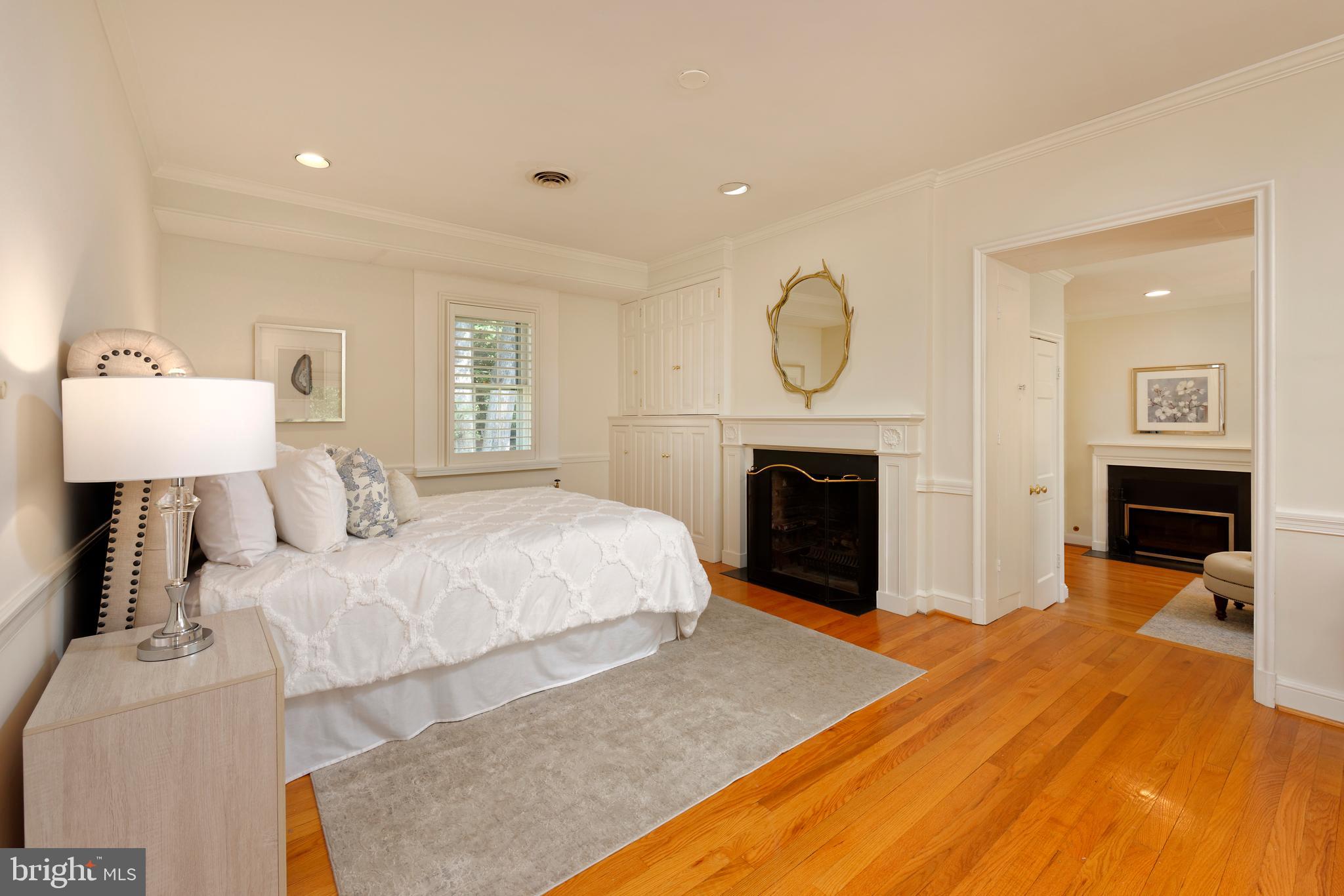 6237 Radcliff Road Alexandria, VA 22307 - Photo 29 of 61 Primary bedroom w/wood burning fireplace