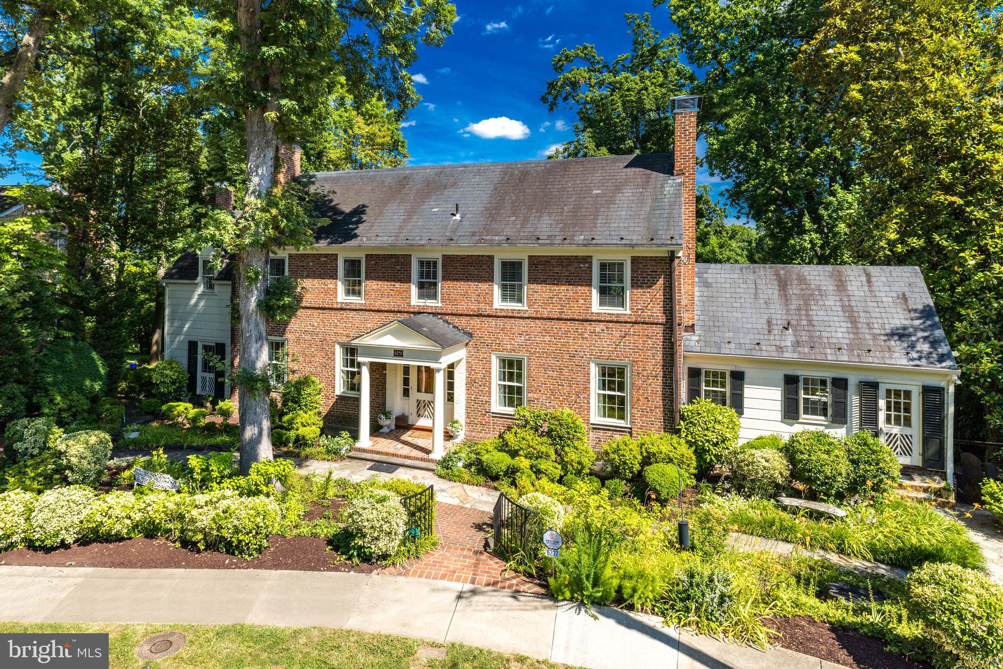 6237 Radcliff Road Alexandria, VA 22307 - Photo 6 of 61 Crisp exterior with backdrop of tall shade trees
