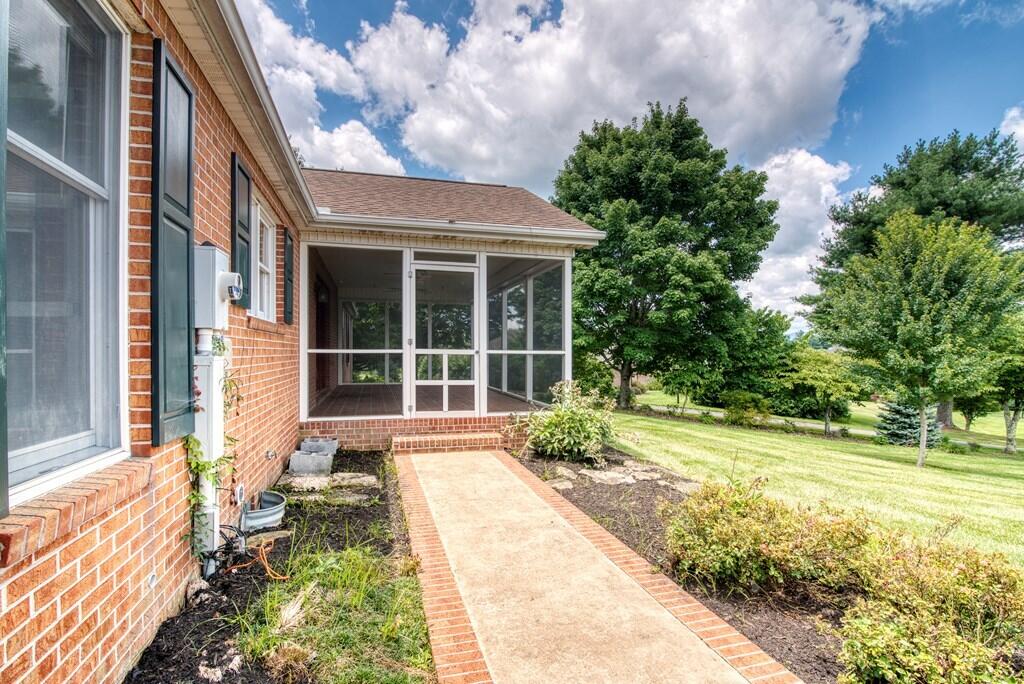 389 Winterham Drive Abingdon, VA 24211 - Photo 45 of 52 Sidewalk leading to Screened-In Porch