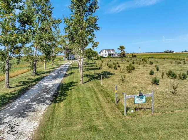 a view of a lake with a yard