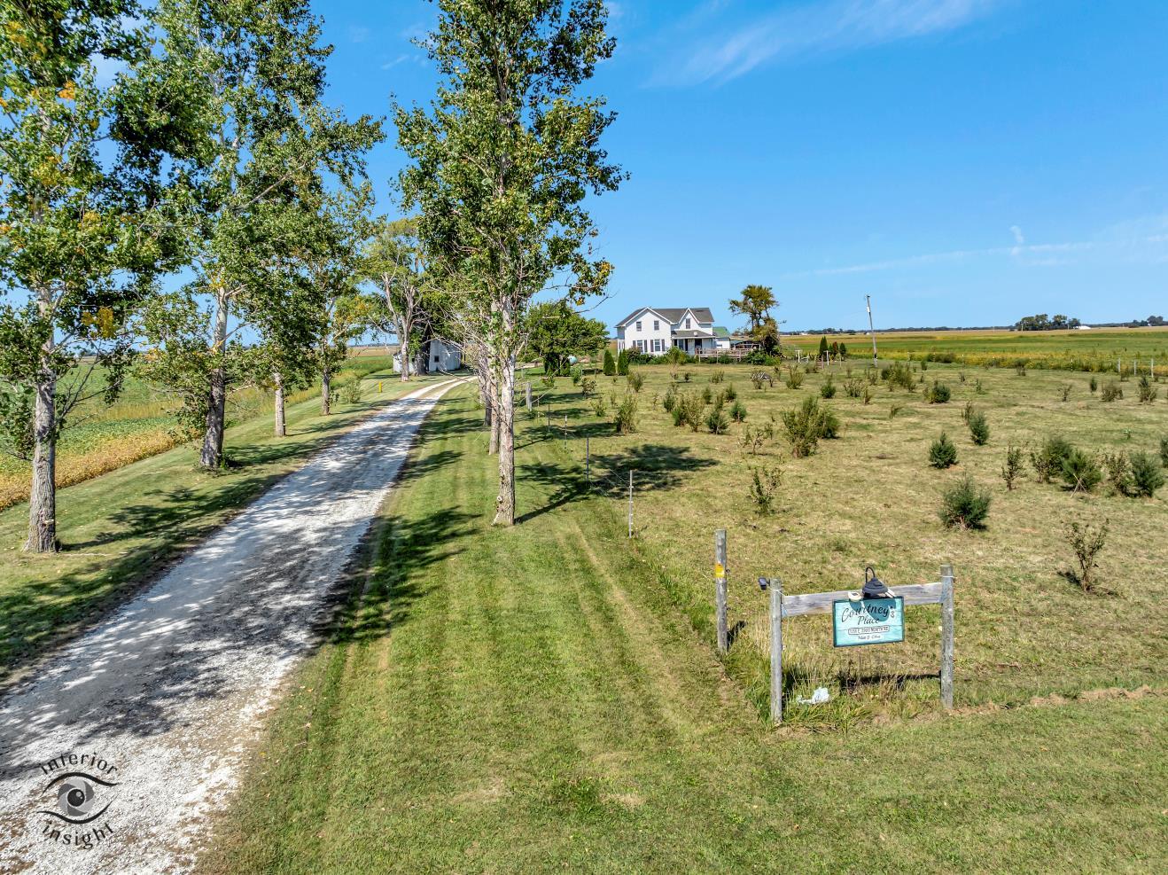 1258 East 2900 North Road Clifton, IL 60927 - Photo 1 of 38 a view of a lake with a yard