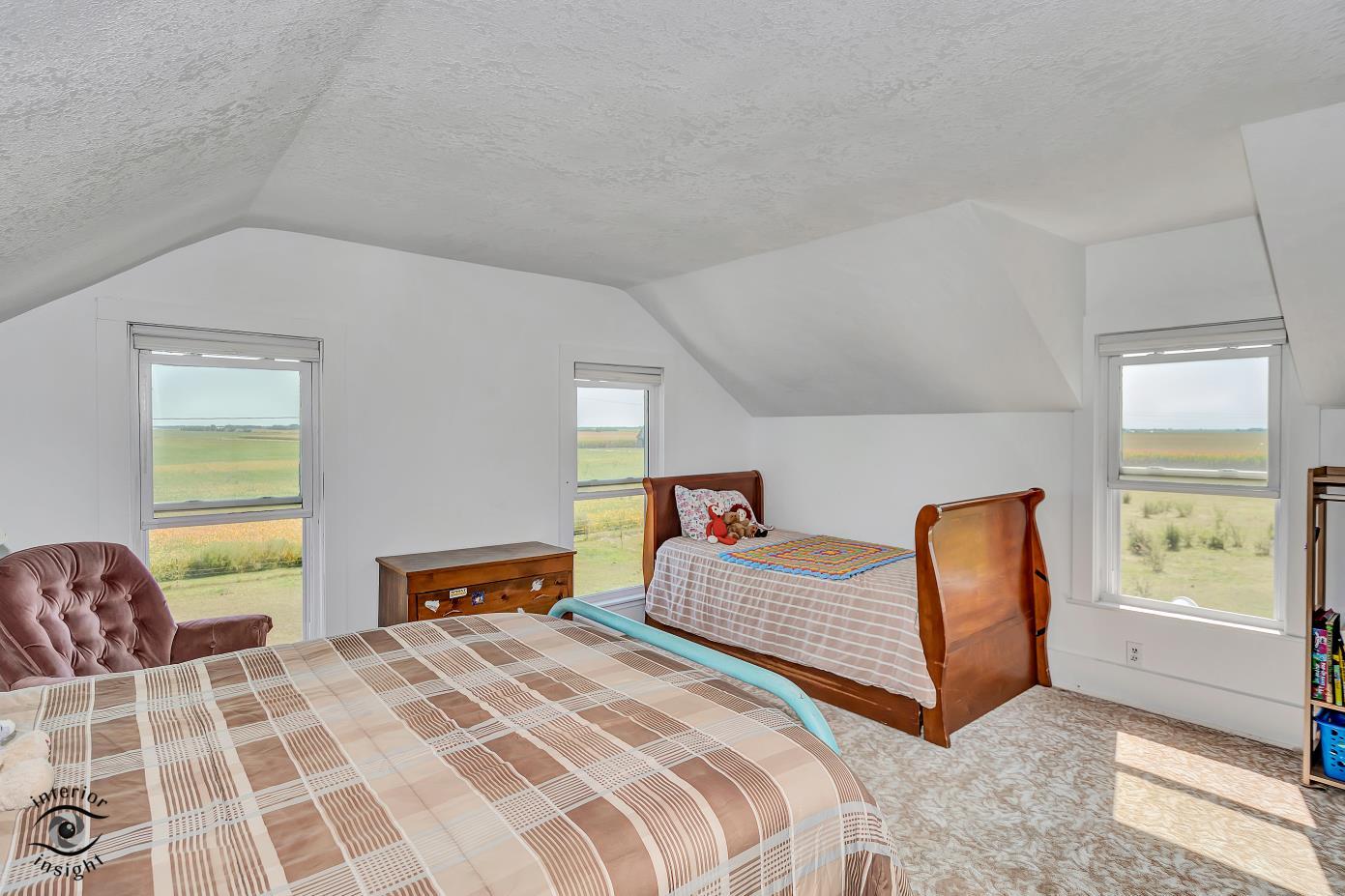 1258 East 2900 North Road Clifton, IL 60927 - Photo 13 of 38 a bedroom with a bed and window