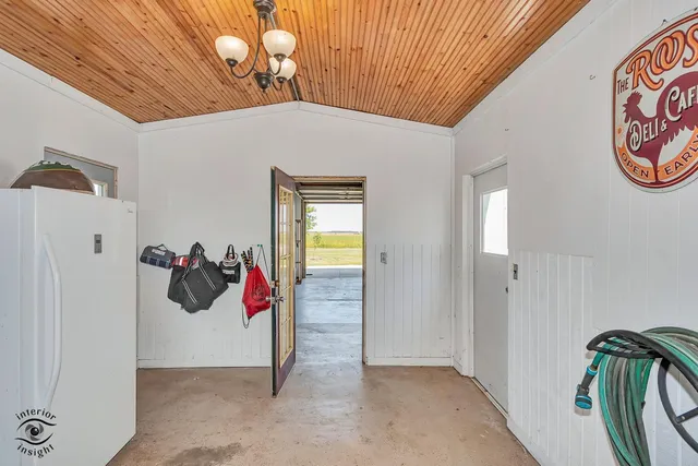 a view of a garage with chairs