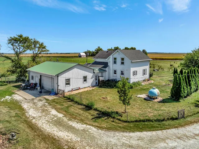 a view of a big yard with an trees