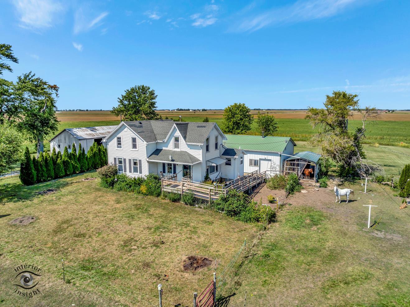 1258 East 2900 North Road Clifton, IL 60927 - Photo 3 of 38 a view of a house with a big yard