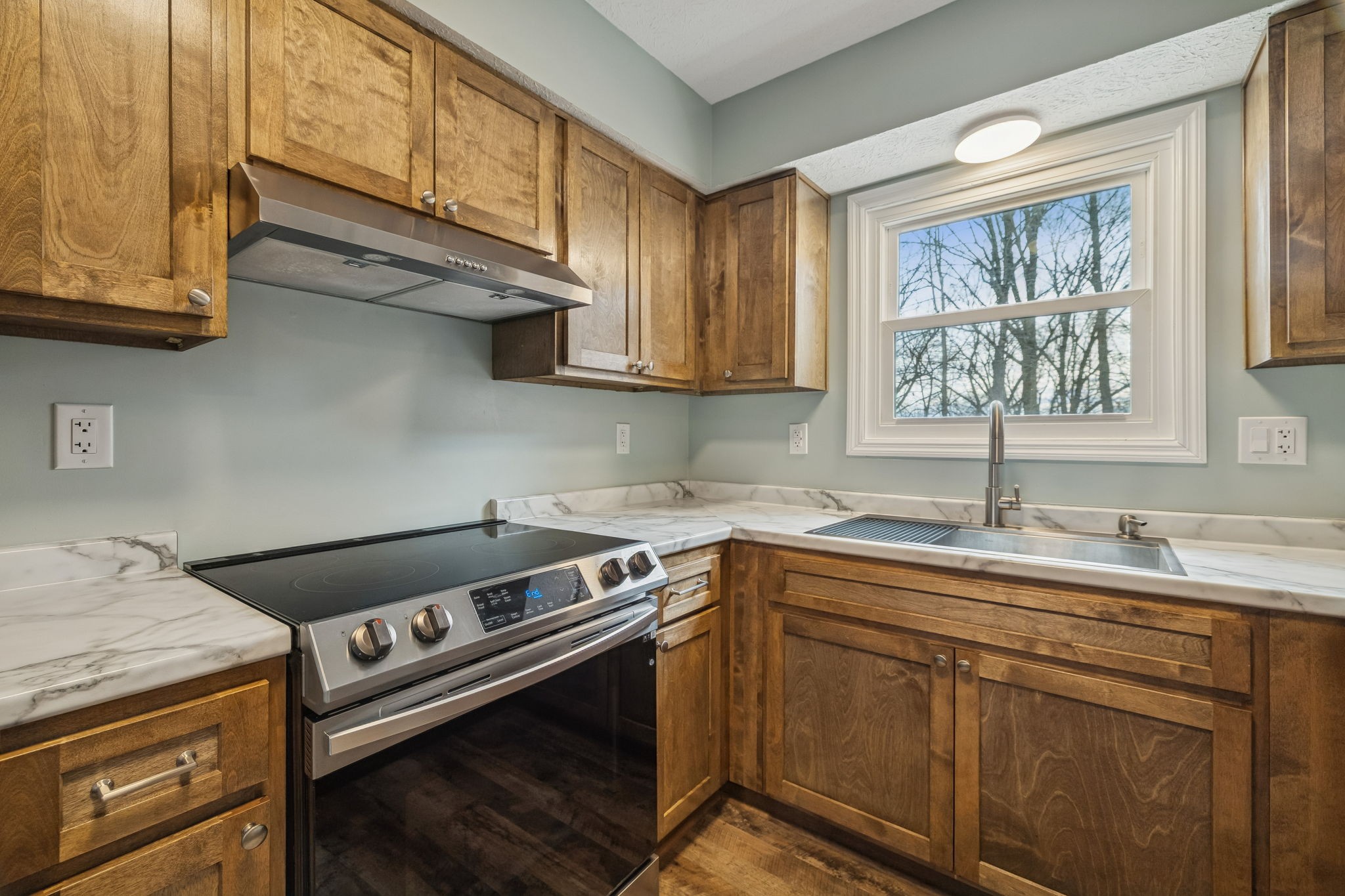179 West Hester Road Cottontown, TN 37048 - Photo 17 of 43 a kitchen with a stove and a sink