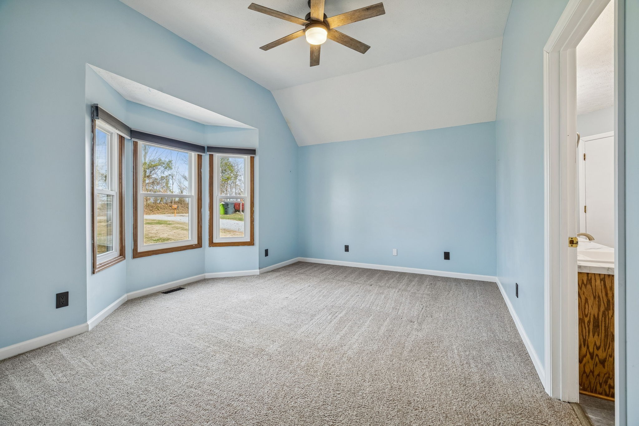 179 West Hester Road Cottontown, TN 37048 - Photo 20 of 43 a view of a livingroom with a ceiling fan and window