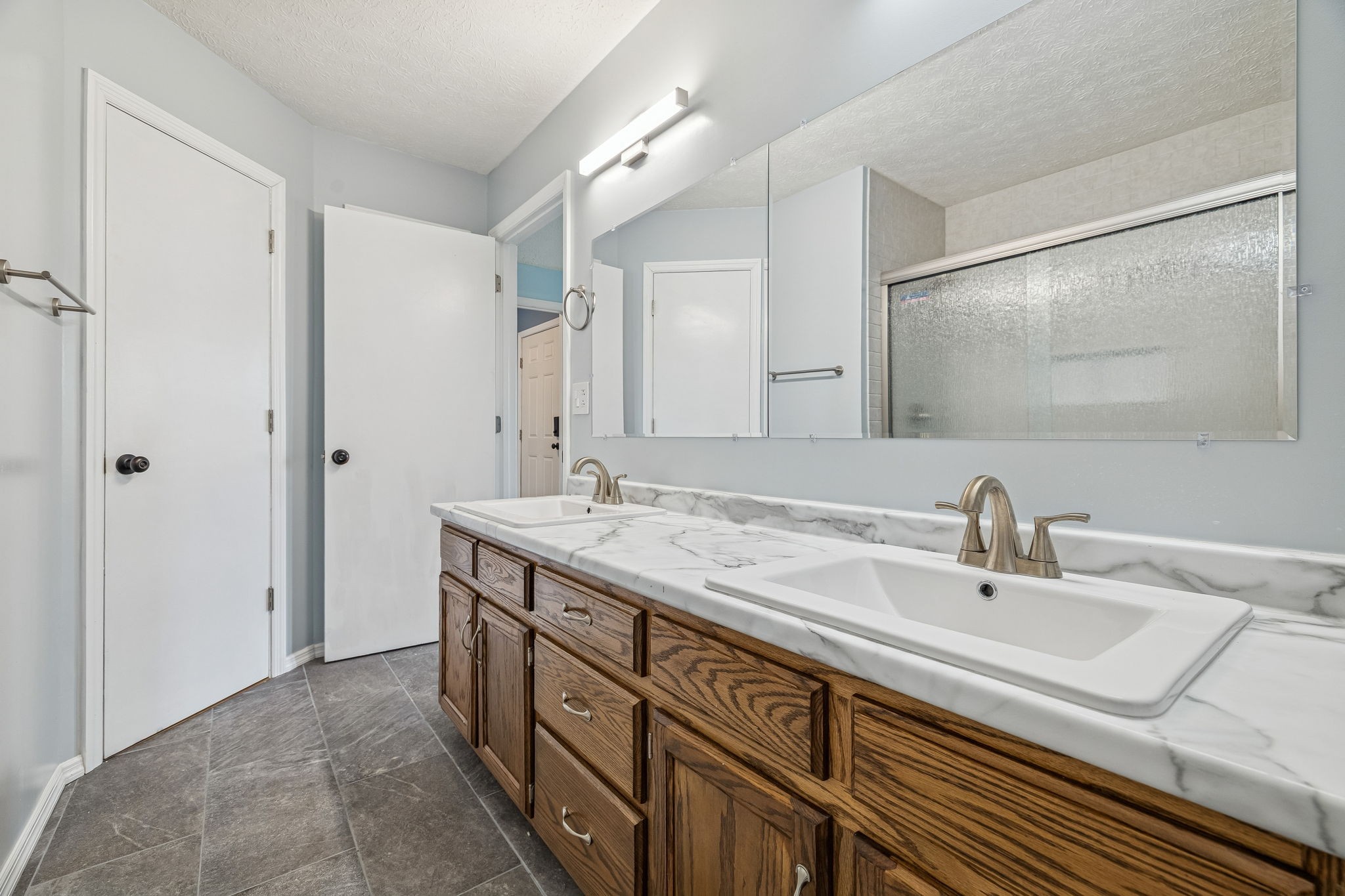 179 West Hester Road Cottontown, TN 37048 - Photo 24 of 43 a bathroom with double sink and a mirror