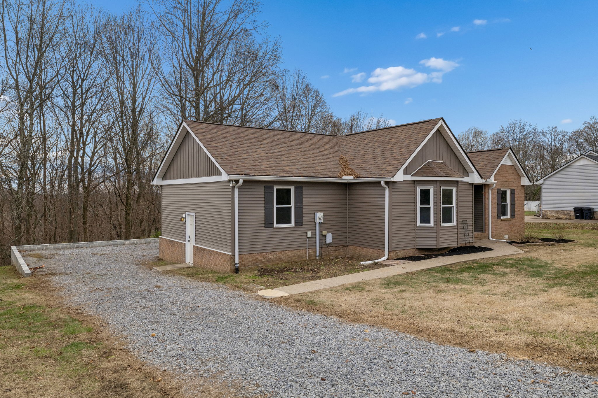 179 West Hester Road Cottontown, TN 37048 - Photo 36 of 43 a view of a house with a yard