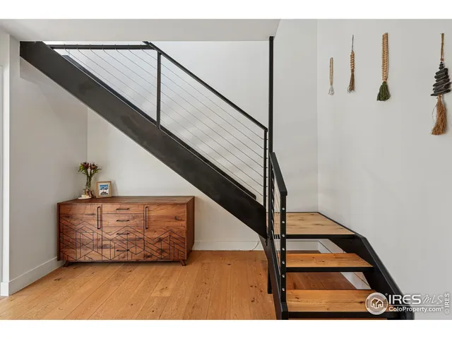 a bedroom with a bed and furniture