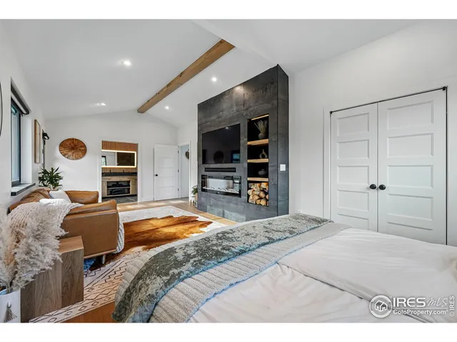 a bathroom with a bathtub and a window