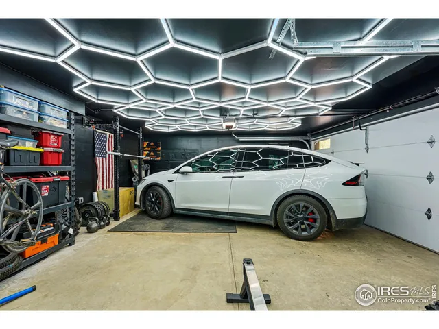 a backyard of a house with yard barbeque oven and outdoor seating
