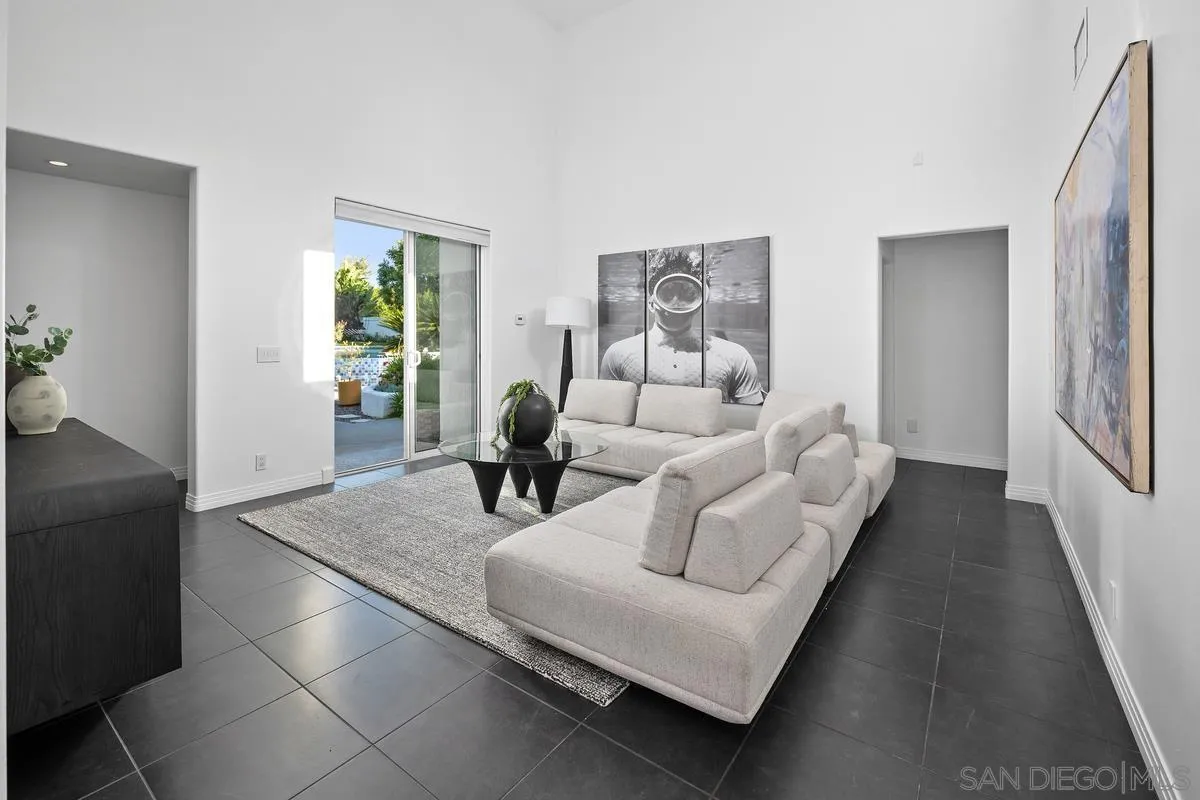 6172 Via Posada Del Norte Rancho Santa Fe, CA 92067 - Photo 13 of 23 a living room with furniture and a table