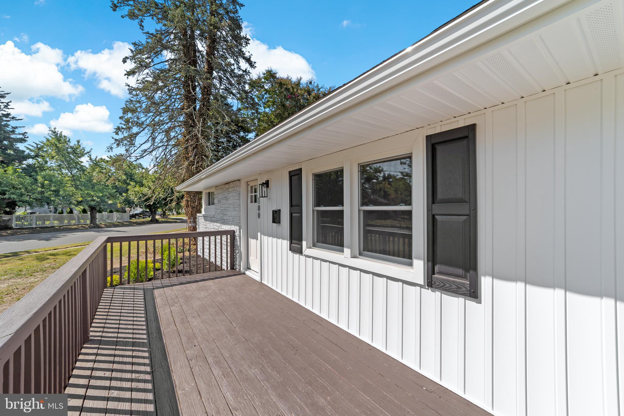 100 Colwick Drive Somers Point, NJ 08244 - Photo 27 of 30 a view of a balcony with wooden floor and fence