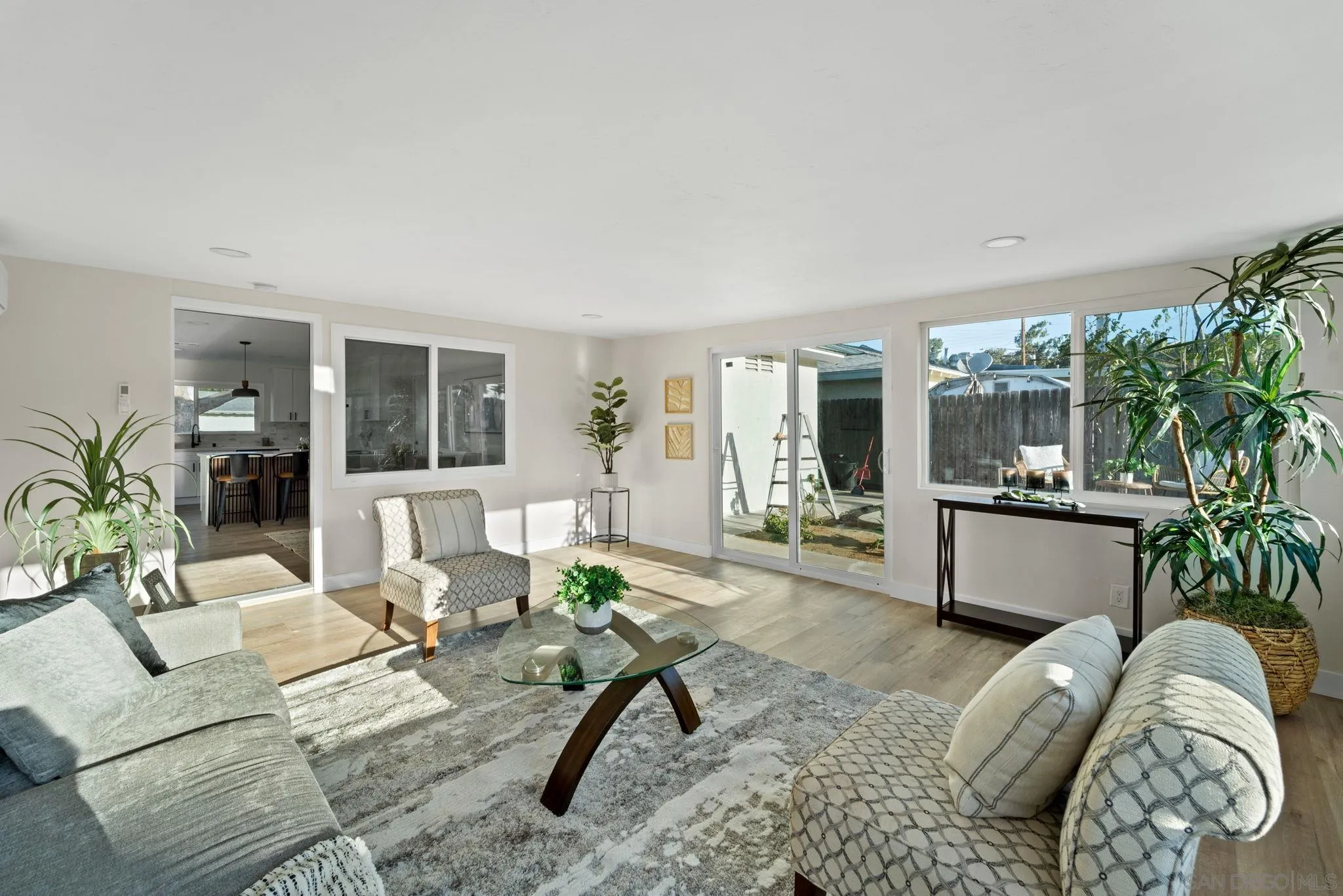 9511 Nicole Way Santee, CA 92071 - Photo 13 of 27 a living room with furniture flowerpot and wooden floor