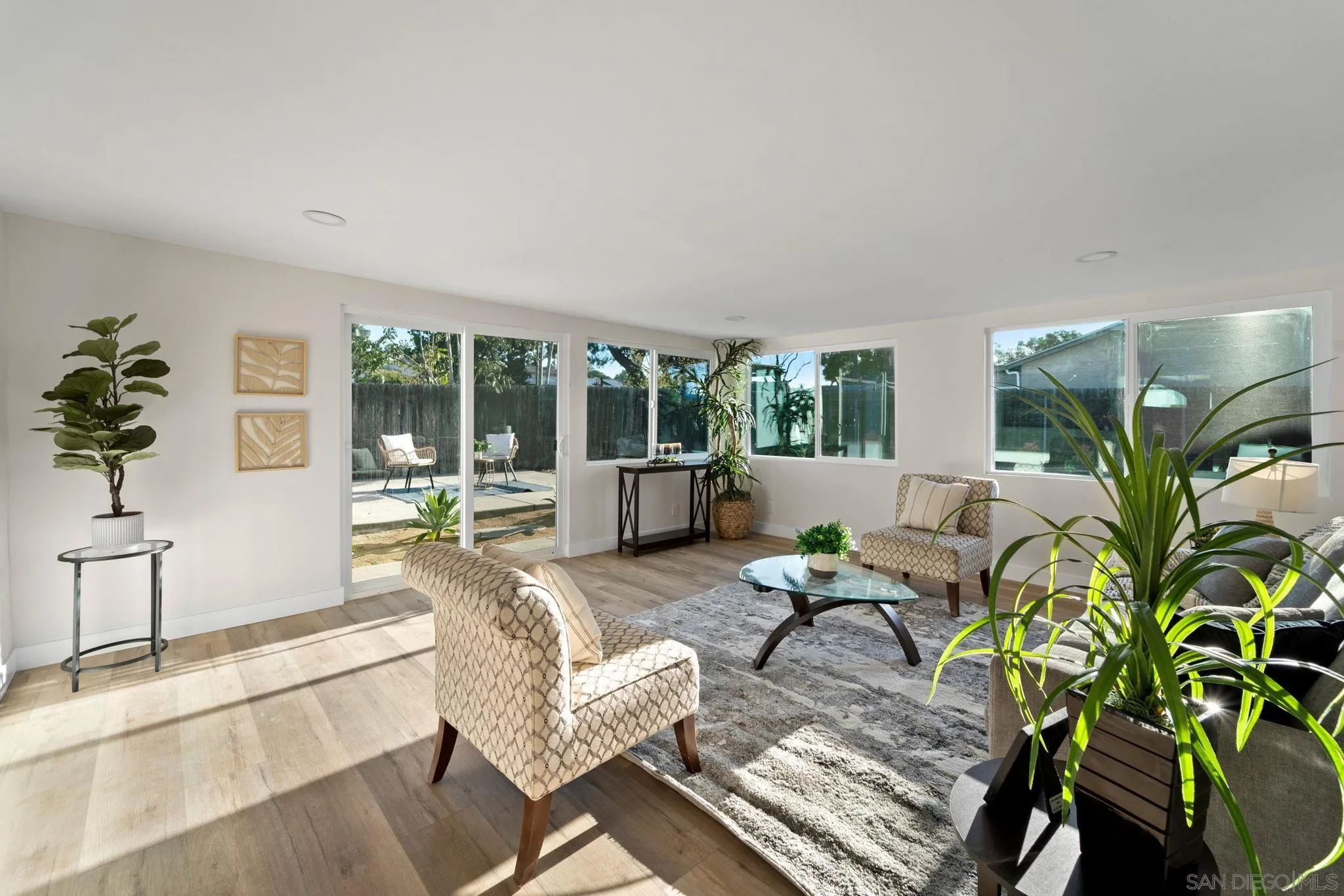 9511 Nicole Way Santee, CA 92071 - Photo 15 of 27 a living room with furniture potted plant and a large window