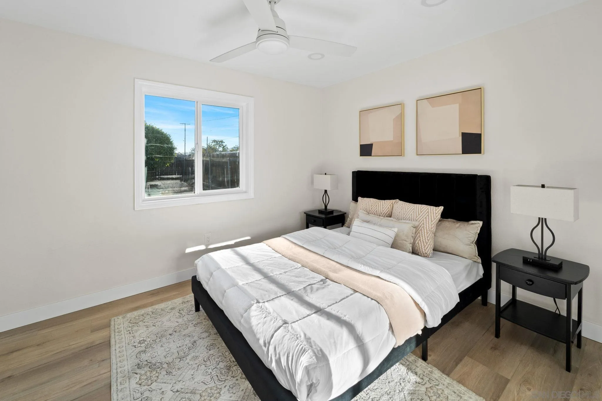 9511 Nicole Way Santee, CA 92071 - Photo 20 of 27 a bedroom with a bed and a window