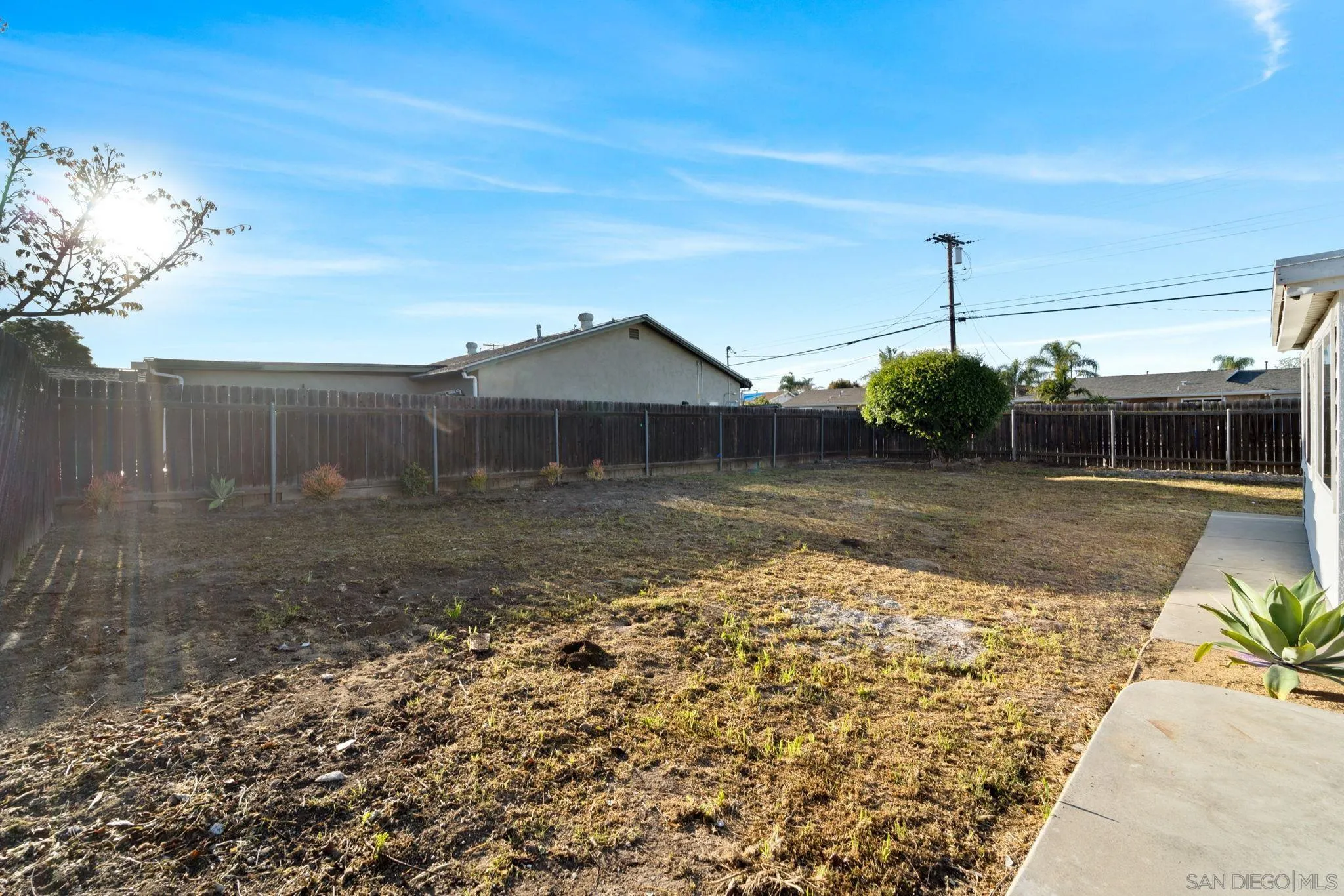9511 Nicole Way Santee, CA 92071 - Photo 25 of 27 a front view of a house with a yard