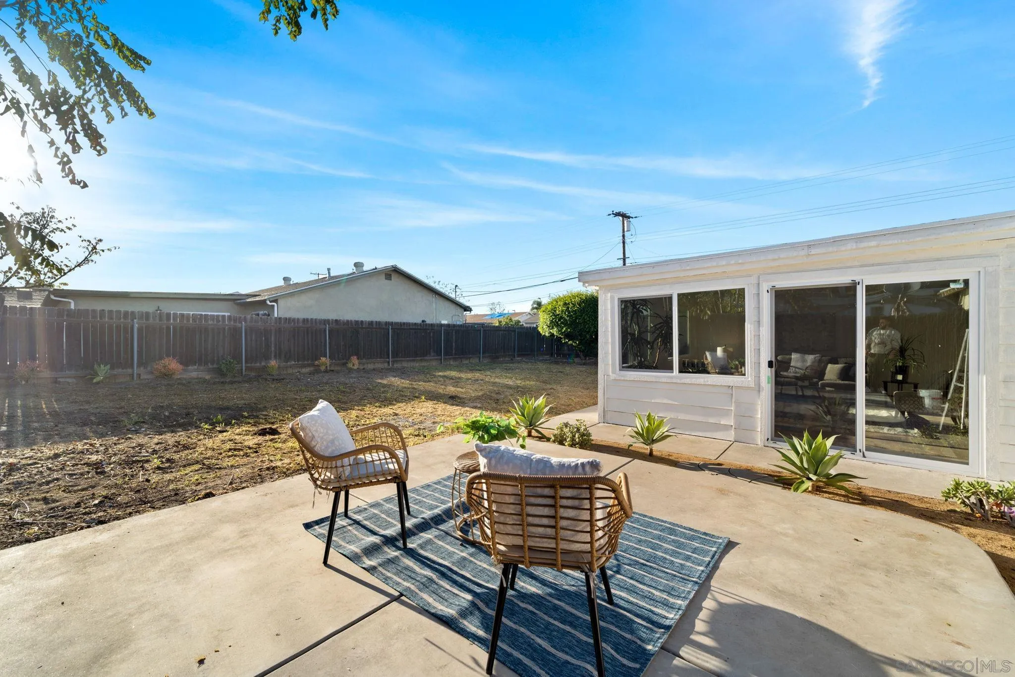 9511 Nicole Way Santee, CA 92071 - Photo 26 of 27 a backyard of a house with table and chairs