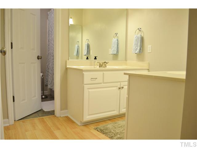 930 Springfork Drive Cary, NC 27513 - Photo 12 of 23 Master bath has two separate vanities.