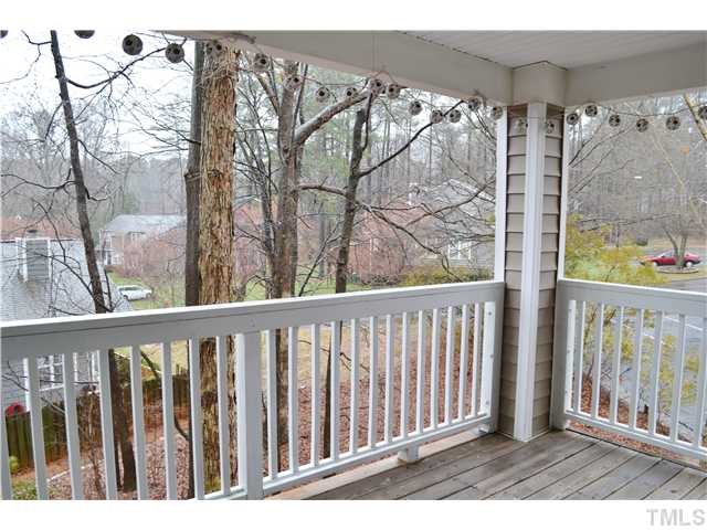 930 Springfork Drive Cary, NC 27513 - Photo 16 of 23 Large covered deck accessible from the family room and master bedroom.