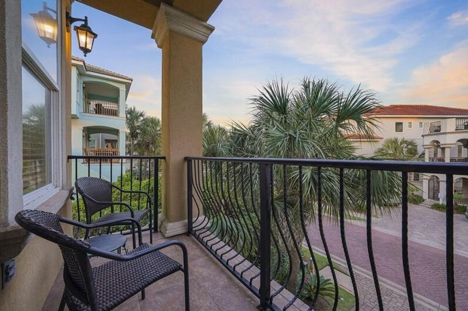 4836 Ocean Boulevard Destin, FL 32541 - Photo 12 of 44 a view of a balcony with chairs