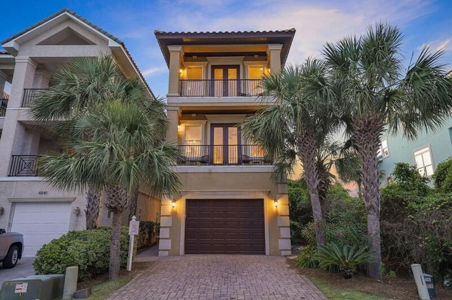 4836 Ocean Boulevard Destin, FL 32541 - Photo 2 of 44 a front view of house with yard