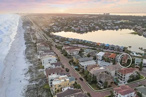 a view of balcony with a potted plant